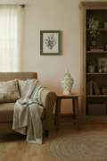 8x10 sage green frame with proportionate ginger jar on side table in cottage living room