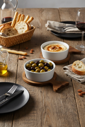 Ceramic Bowls on Wood Paddle Boards — Table Setting