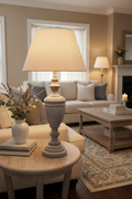 Grey whitewashed urn lamp in a cosy elegant living room