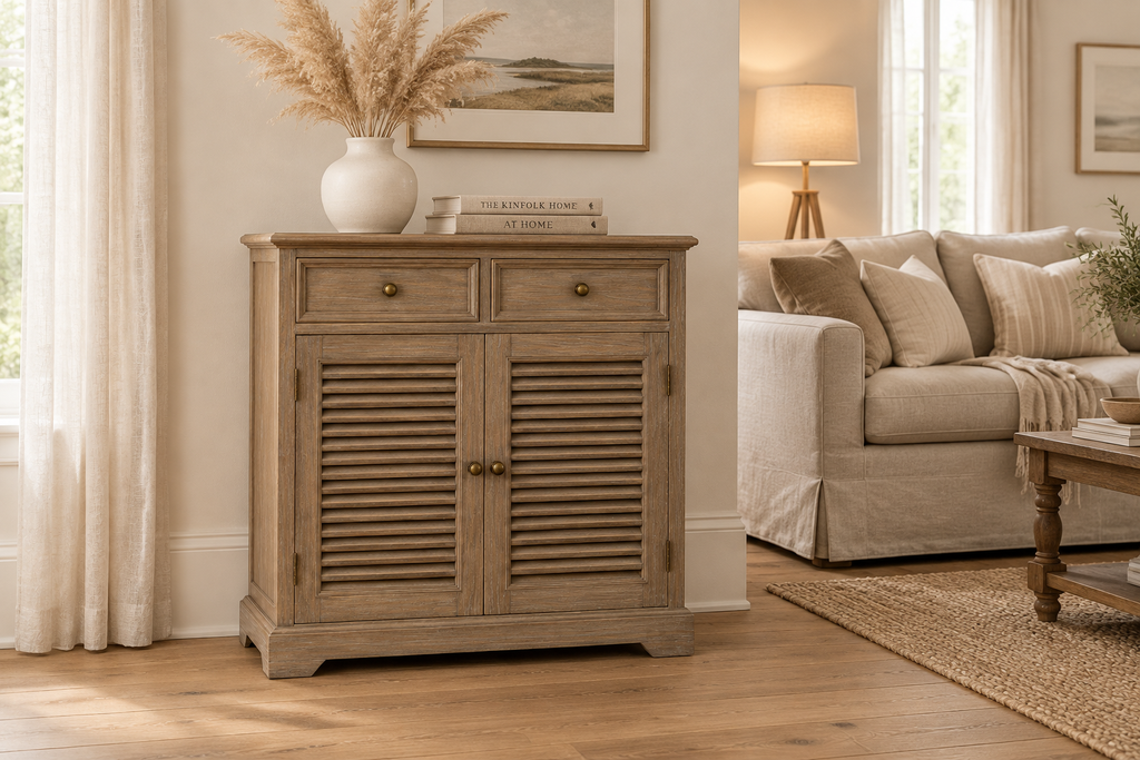 Louvre shutter sideboard styled in a living room with oak flooring and linen accents