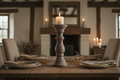 Rustic mango wood candle holder as solo centrepiece on farmhouse dining table, no surrounding candles